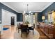 Elegant dining room featuring a stylish light fixture and sophisticated decor at 4622 Cotton Creek Dr, Charlotte, NC 28226