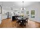 Eat-in kitchen with pendant lighting, stainless steel appliances, and access to the backyard at 4622 Cotton Creek Dr, Charlotte, NC 28226