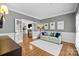 Inviting living room with French doors, a fireplace, and ample natural light at 4622 Cotton Creek Dr, Charlotte, NC 28226