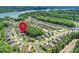 A high aerial view of the neighborhood, marked with a pin indicating its location near the lake at 528 Sandbar Pt, Clover, SC 29710
