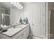 Elegant bathroom featuring granite countertops, white cabinets, and a glass shower at 528 Sandbar Pt, Clover, SC 29710
