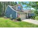 Beautiful home with a well-kept lawn, featuring a two-car garage and inviting curb appeal at 528 Sandbar Pt, Clover, SC 29710