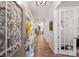 Elegant hallway with hardwood floors, crown molding, and stylish decor at 528 Sandbar Pt, Clover, SC 29710