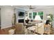 Cozy living room featuring a fireplace, large windows, and comfortable seating at 528 Sandbar Pt, Clover, SC 29710
