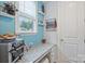 Bright office nook featuring granite countertops, window, and stylish decor at 528 Sandbar Pt, Clover, SC 29710