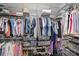 Walk-in closet with metal shelving and hanging racks for ample storage at 528 Sandbar Pt, Clover, SC 29710
