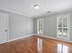 Bright bedroom with hardwood floors, crown molding, and natural light at 5308 Sunningdale Dr, Charlotte, NC 28277