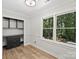 Bedroom with a built-in desk and natural light from the exterior window at 5308 Sunningdale Dr, Charlotte, NC 28277