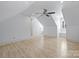 Large bonus room with an airy atmosphere, ceiling fan, and great natural light at 5308 Sunningdale Dr, Charlotte, NC 28277
