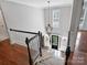 Grand foyer featuring high ceilings, a statement chandelier, and elegant staircase at 5308 Sunningdale Dr, Charlotte, NC 28277