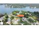 Beautiful waterfront home with a private pool and manicured lawn, ideal for luxurious lakeside living at 554 Isle Of Pines Rd, Mooresville, NC 28117
