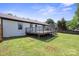 View of the deck and large, grassy backyard, perfect for Gathering gatherings at 554 Isle Of Pines Rd, Mooresville, NC 28117