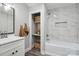 Renovated bathroom with tub, shower, vanity and extra storage at 554 Isle Of Pines Rd, Mooresville, NC 28117
