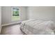 Bright bedroom with hardwood floors, neutral paint, and natural light at 554 Isle Of Pines Rd, Mooresville, NC 28117