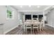 Open floor plan features a dining room with a view of the living room at 554 Isle Of Pines Rd, Mooresville, NC 28117