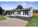 Well-maintained home with clean lines, and side driveway at 554 Isle Of Pines Rd, Mooresville, NC 28117