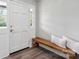 Bright foyer with a bench, hardwood floors, and ample natural light at 554 Isle Of Pines Rd, Mooresville, NC 28117