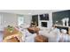Living room features a fireplace and plenty of natural light at 554 Isle Of Pines Rd, Mooresville, NC 28117