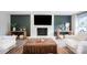 Living room features a fireplace, and dark accent wall at 554 Isle Of Pines Rd, Mooresville, NC 28117