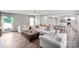 Open floor plan features a bright living room with large windows at 554 Isle Of Pines Rd, Mooresville, NC 28117