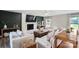 Bright living room features a fireplace and plenty of seating at 554 Isle Of Pines Rd, Mooresville, NC 28117