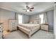 Bright bedroom with neutral walls, ceiling fan, and natural light at 622 University Dr, Rock Hill, SC 29730