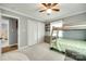 Cozy bedroom featuring a bunk bed, closet, carpet flooring, and a ceiling fan at 622 University Dr, Rock Hill, SC 29730