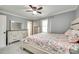 Serene bedroom with natural light, ceiling fan, and soft carpet, perfect for relaxing at 622 University Dr, Rock Hill, SC 29730