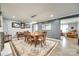 Spacious dining room with hardwood floors, a classic table setting, and seamless flow to the living area at 622 University Dr, Rock Hill, SC 29730