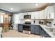 Well-lit kitchen featuring granite counters, stainless steel appliances, and ample cabinet space at 622 University Dr, Rock Hill, SC 29730