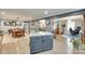 Open kitchen and dining area with hardwood floors and granite countertops, perfect for entertaining at 622 University Dr, Rock Hill, SC 29730