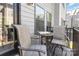 Outdoor balcony featuring seating and a view of surrounding buildings at 625 Uwharrie River Rd, Charlotte, NC 28211