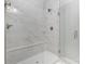 Bathroom featuring a glass enclosed shower with marble tiling, a built-in seat, and chrome hardware at 625 Uwharrie River Rd, Charlotte, NC 28211