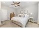 Cozy bedroom featuring a comfortable bed, neutral tones, and dresser at 625 Uwharrie River Rd, Charlotte, NC 28211