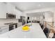 Open kitchen features stainless steel appliances, white cabinetry, and a large island with seating at 625 Uwharrie River Rd, Charlotte, NC 28211
