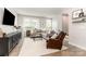 Inviting living room with comfortable seating, a large TV, and stylish decor at 625 Uwharrie River Rd, Charlotte, NC 28211
