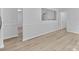 Open living area with hard flooring, neutral paint, with views of the other rooms at 6412 Sullins Rd, Charlotte, NC 28214