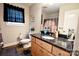 Stylish bathroom with updated vanity, granite counters, and sleek fixtures at 650 Harry St, China Grove, NC 28023