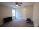 Neutral bedroom featuring a ceiling fan and cozy carpeting at 650 Harry St, China Grove, NC 28023
