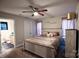 Inviting bedroom featuring a cozy bed, ceiling fan, and ample natural light at 650 Harry St, China Grove, NC 28023