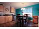 Warm dining area with a stylish table set and adjacent kitchen space at 650 Harry St, China Grove, NC 28023