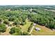 Expansive aerial view of the property, showcasing lush greenery and the home's generous lot size at 6992 Sherrills Ford Rd, Sherrills Ford, NC 28673