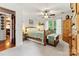 Cozy bedroom boasts plush carpeting, wood furniture, and views of the outdoors, creating a restful retreat at 6992 Sherrills Ford Rd, Sherrills Ford, NC 28673