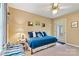 Relaxing bedroom with ceiling fan, comfortable bed, neutral color palette, and natural light at 6992 Sherrills Ford Rd, Sherrills Ford, NC 28673