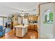Bright, open kitchen with an island, oak cabinets, and easy access to the adjacent living and dining areas at 6992 Sherrills Ford Rd, Sherrills Ford, NC 28673