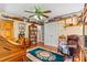 Welcoming living room with hardwood floors, area rug, ceiling fan, and comfortable seating at 6992 Sherrills Ford Rd, Sherrills Ford, NC 28673