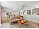 This comfy living space boasts an open floorplan, kitchen access, neutral tones, and large windows with natural light at 6992 Sherrills Ford Rd, Sherrills Ford, NC 28673