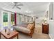 This open-concept living space features dining, kitchen, an exit to the backyard, and abundant natural lighting at 6992 Sherrills Ford Rd, Sherrills Ford, NC 28673