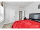 A well lit bedroom features neutral walls, carpeting, and a large window with blinds at 720 Herlong S Ave, Rock Hill, SC 29732