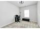 The bedroom is an empty canvas with neutral walls, carpet, and a desk setup at 720 Herlong S Ave, Rock Hill, SC 29732
